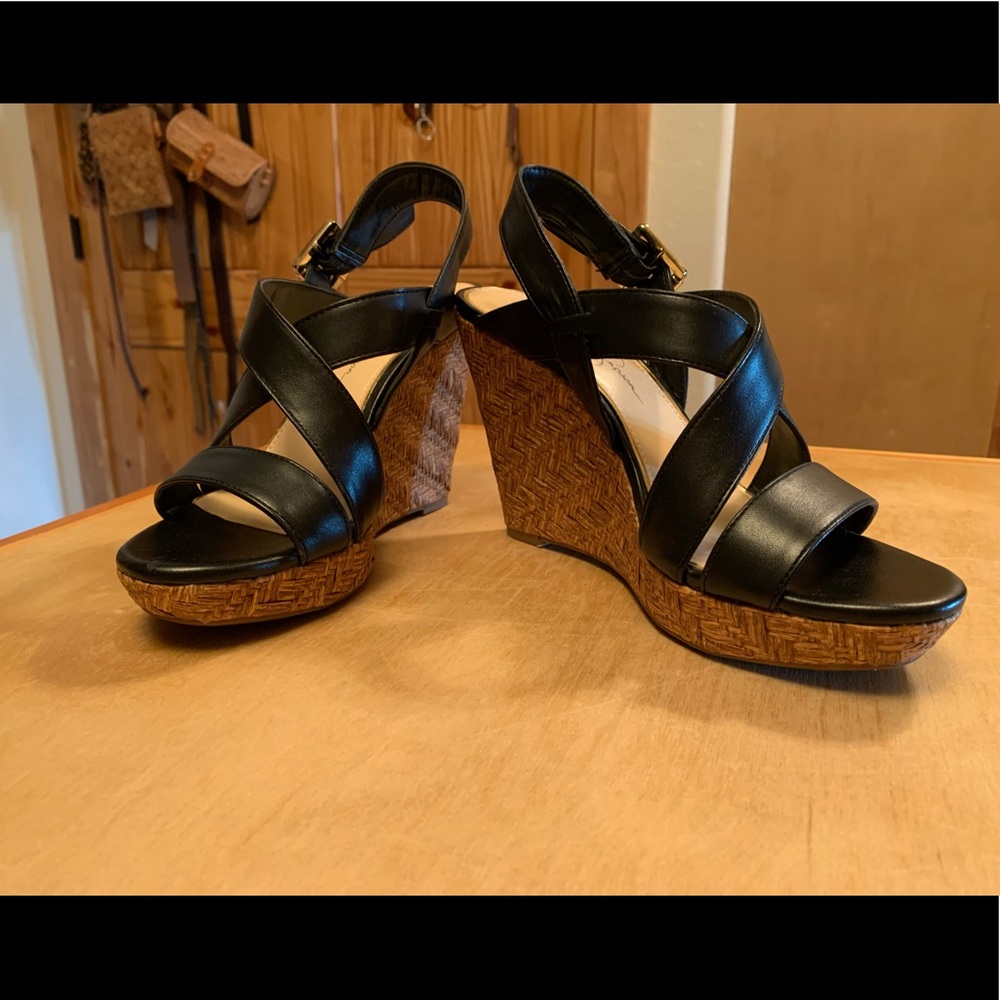 Black leather wedge heal shoes